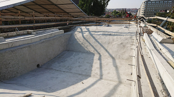 Prostor mezi oblouky bude po položení hydroizolace vyplněn mezerovitým betonem