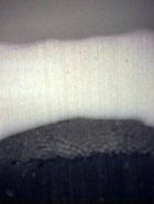 Obr. 17: Detailní snímek kryté části zkušebního vzorku – příčný řez